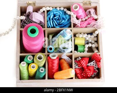 thread and material for handicrafts in box isolated on white Stock Photo