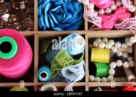 thread and material for handicrafts in box close-up Stock Photo