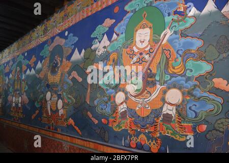 Wall art at Rinpung Dzong, the main monastery and fortress in Paro, Bhutan, which dates from 1645 and contains 14 shrines and chapels. Stock Photo