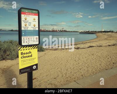 Melbourne, Australia - Beach Closed due to COVID-19 Coronavirus sign in Port Melbourne Stock Photo