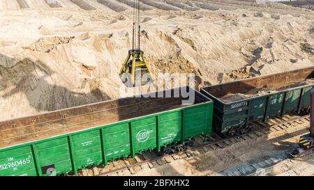 top view, loading sand into wagons Stock Photo