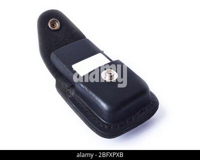 Metal lighter in leather case with blank copy space isolated on white. Stock Photo