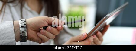 Two architects discussing drawing together using tablet pc Stock Photo