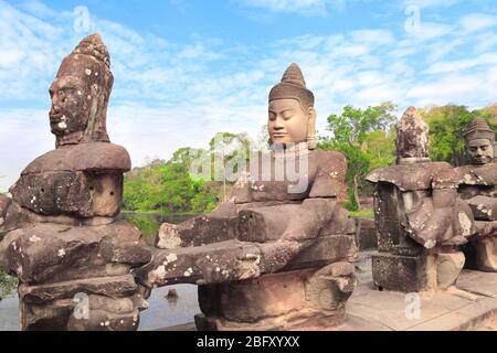 Giants guardians in Front Gate in Prasat Bayon Temple, famous landmark Angkor Wat complex, khmer culture, Siem Reap, Cambodia Stock Photo