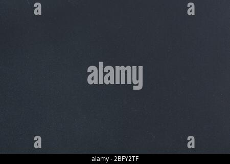 Dark blue leather close up. Can be used as background in art or design projects. Stock Photo