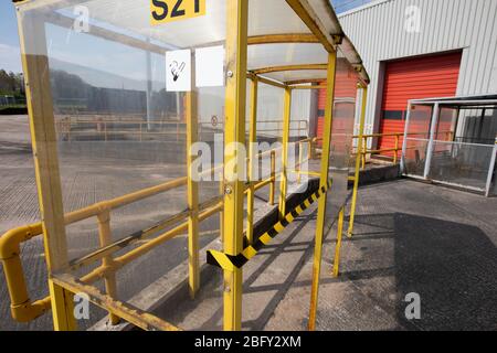 A closed off smoking area at the Vauxhall car factory photographed undergoing preparedness tests and redesign ahead of re-opening following the COVID-19 outbreak. Located in Ellesmere Port, Wirral, the factory opened in 1962 and currently employs around 1100 workers. It ceased production on 17 March 2020 and will only resume work upon the advice of the UK Government, which will involve stringent physical distancing measures being in place across the site. Stock Photo