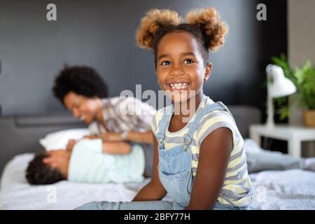 Happy family spending time together and having fun at home Stock Photo