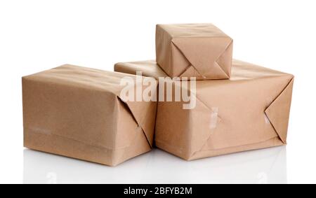 parcels boxes with kraft paper, isolated on white Stock Photo