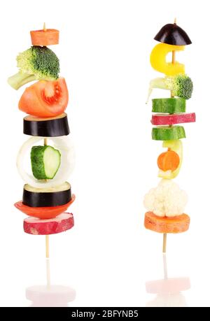 Sliced vegetables on wooden pick isolated on white Stock Photo