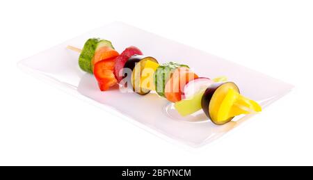 Sliced vegetables on wooden pick isolated on white Stock Photo