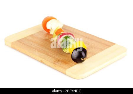 Sliced vegetables on wooden pick isolated on white Stock Photo