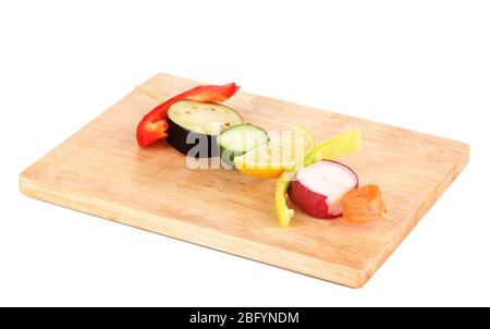Sliced vegetables on wooden pick isolated on white Stock Photo
