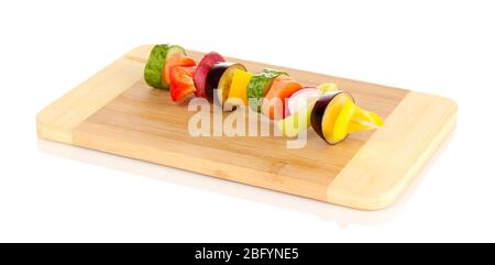 Sliced vegetables on wooden pick isolated on white Stock Photo