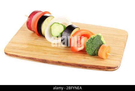 Sliced vegetables on wooden pick isolated on white Stock Photo