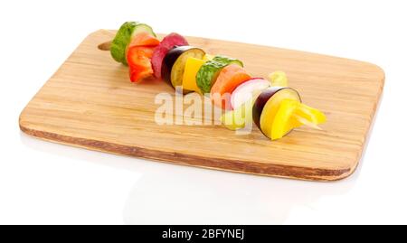 Sliced vegetables on wooden pick isolated on white Stock Photo