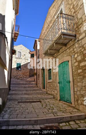 A narrow street between the old houses of the village of Castropignano in the province of Campobasso Stock Photo