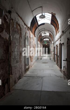 Vertical view of one of the  Eastern State Penitentiary corridors, Philadelphia, Pennsylvania Stock Photo