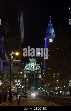 Vertical night view of Market St with the City Hall building in the background, Philadelphia, Pennsylvania Stock Photo