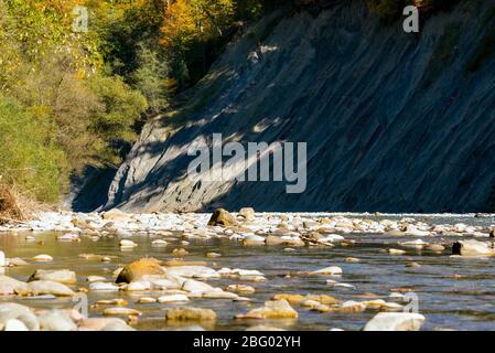 Fall landscape with mountain river and forest. Russia, Caucasus, Adygeya Stock Photo