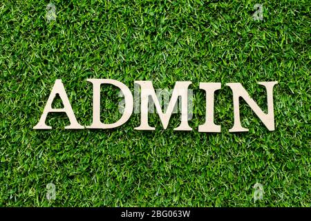 Wood letter block in word admin on artificial green grass background Stock Photo