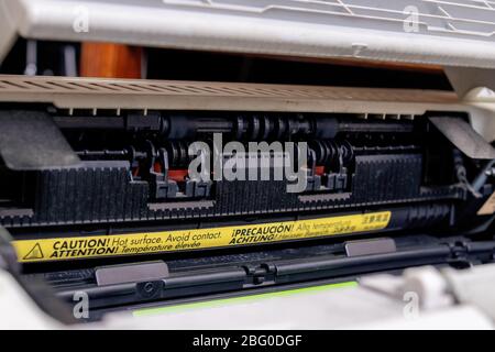 Black cartridge in the printer with dust Stock Photo