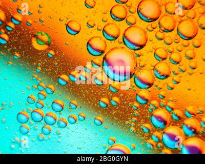 Oil bubbles in water Stock Photo