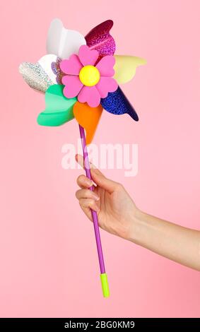 Pinwheel Hand Hand Holding a Colorful Rainbow Pinwheel Minimalist 3D Rendering in a ...