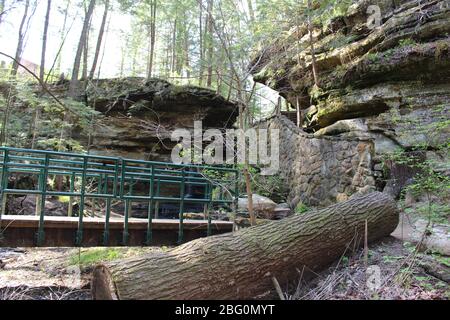 Old man cave walk trail and water fall in Ohio State,nature green landscape and green trees wood suspension bridge,water canal Stock Photo