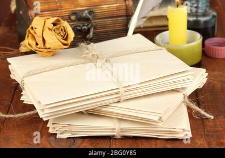 Stacks of old letters on wooden table Stock Photo
