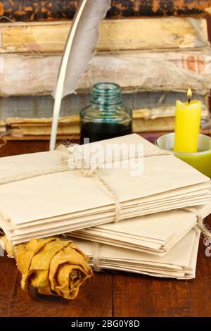 Stacks of old letters on wooden table Stock Photo