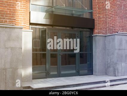 Blank black rectangular box store entrance mockup, glass brick wall Stock Photo