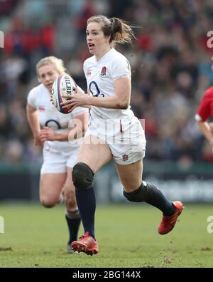 England's Emily Scarratt is tackled during the Women's Rugby World Cup ...