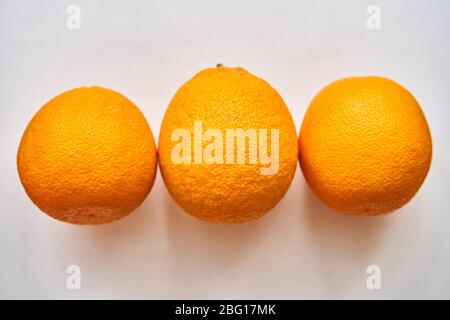 A group of oranges on a table Stock Photo