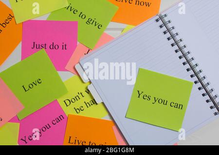 Motivational words on colorful stickers on white background. A vision Board. Copy space. Cards with words. Affirmation, development, training, seminar Stock Photo