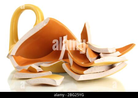 Yellow broken cup isolated on white Stock Photo