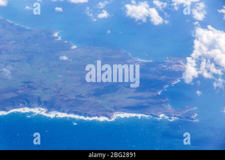 Beautiful aerial view through the airplane window of Cape St. Vincent (Portuguese: Cabo de Sao Vicente), Algarve region, southern Portugal Stock Photo
