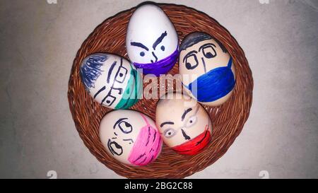 easter eggs funny painted covid 19 during  coronavirus disease . Igoumenitsa Greece Stock Photo