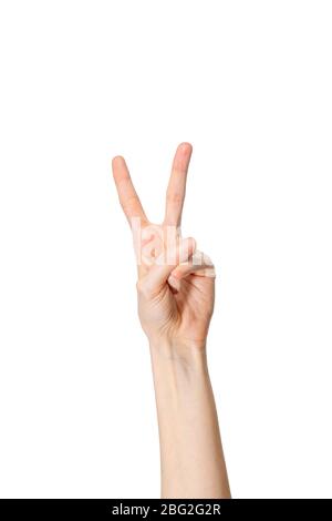 Young Caucasian female left hand, palm facing camera showing number 2. Counting gesture. Stock Photo