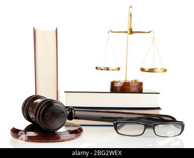 Golden scales of justice, gavel and books isolated on white Stock Photo