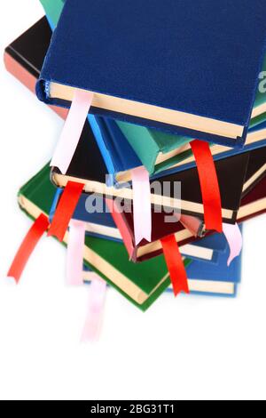 Many books with bookmarks isolated on white Stock Photo