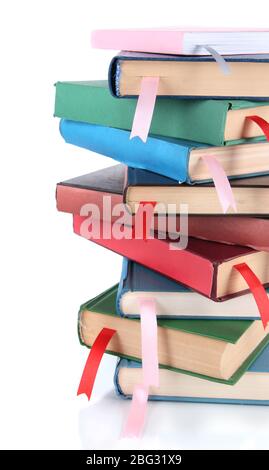 Many books with bookmarks isolated on white Stock Photo