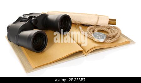 Black modern binoculars with old notebook isolated on white Stock Photo