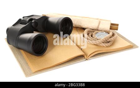 Black modern binoculars with old notebook isolated on white Stock Photo