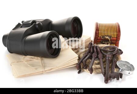 Black modern binoculars with letters and old keys isolated on white Stock Photo
