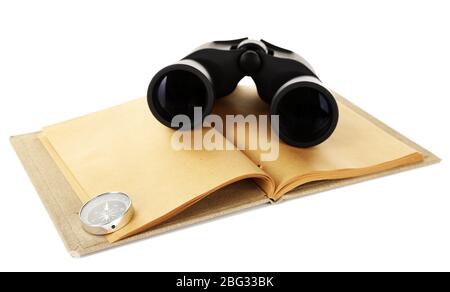 Black modern binoculars with old notebook isolated on white Stock Photo