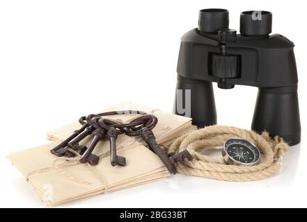 Black modern binoculars with old keys and letters isolated on white Stock Photo