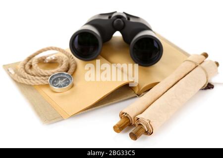 Black modern binoculars with old notebook isolated on white Stock Photo