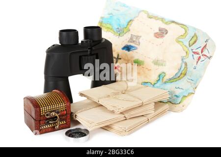 Black modern binoculars with old letters and map of adventure isolated on white Stock Photo