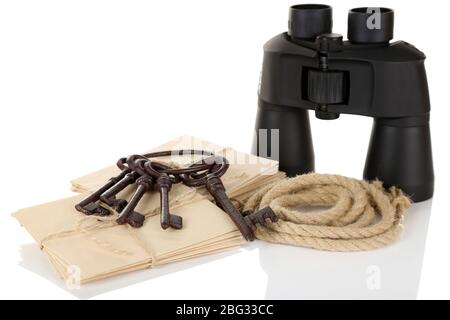 Black modern binoculars with old keys and letters isolated on white Stock Photo