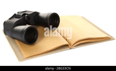Black modern binoculars with old notebook isolated on white Stock Photo